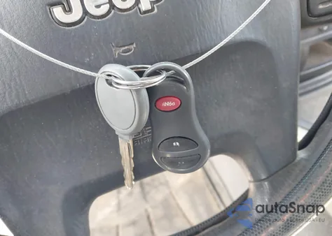 2003 Jeep Grand Cherokee Laredo z USA, uszkodzony, nr VIN 1J4GX48S73C595014